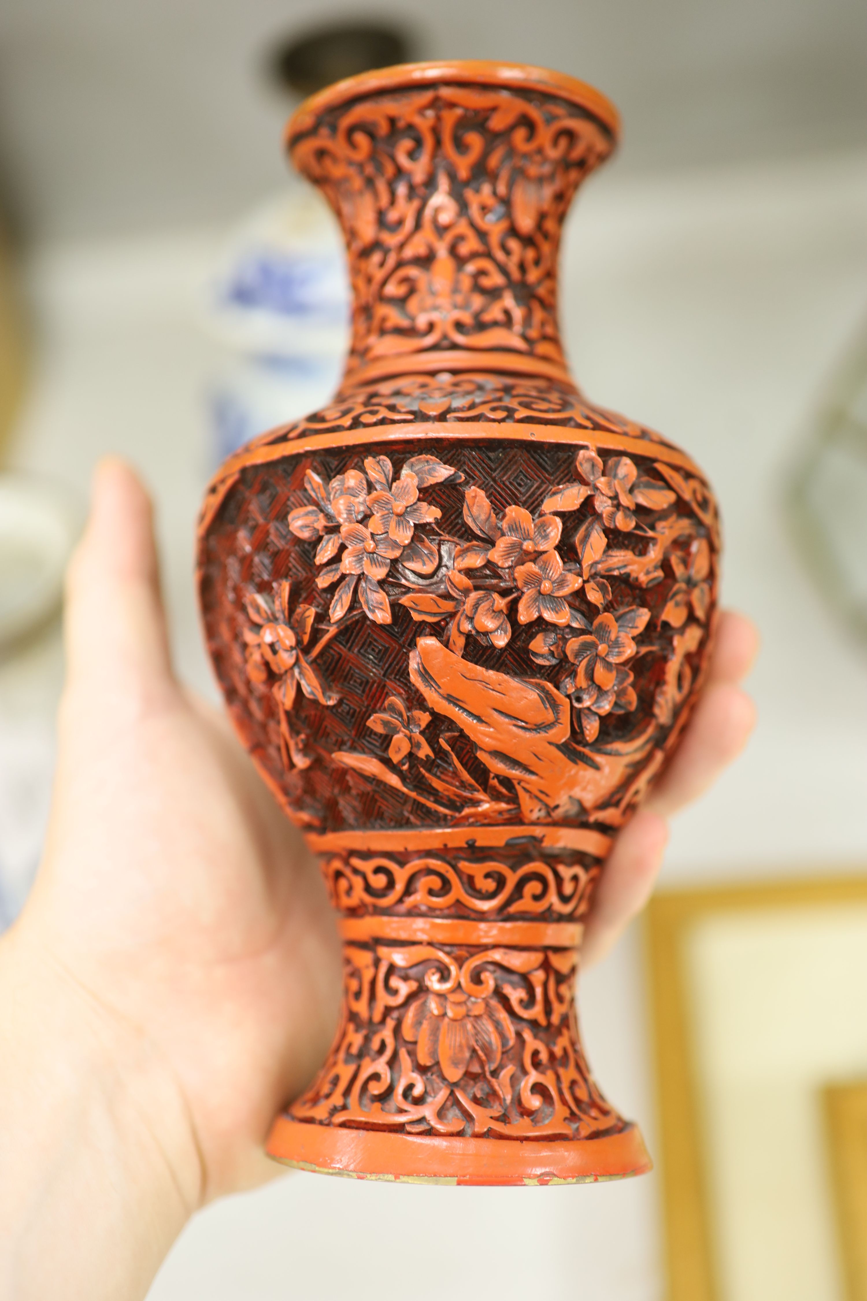 Three Chinese blue and white vases, a cloisonne enamel vase, another vase and a soapstone figure